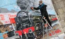 Great Scot! Large artwork sees famous loco gatecrash the city walls