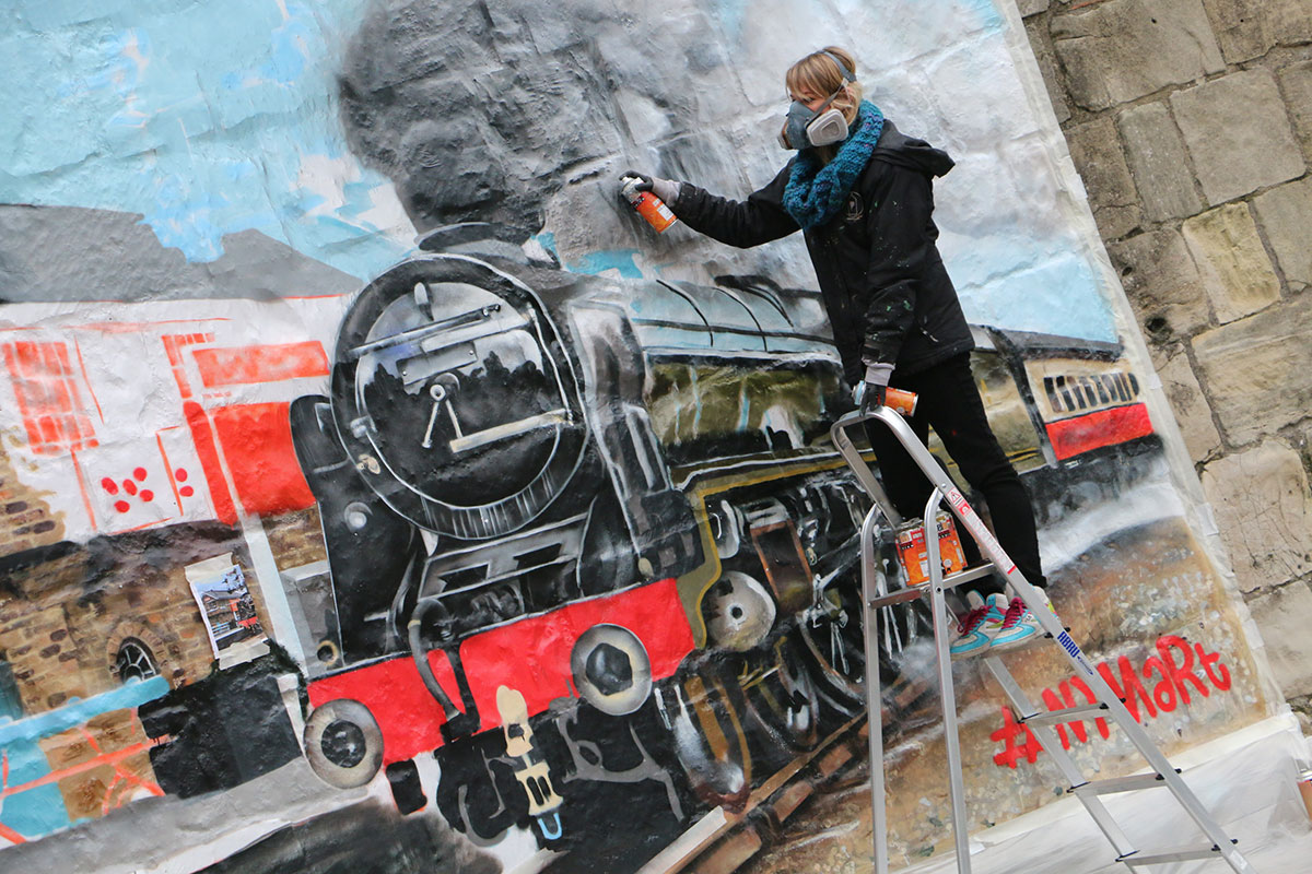 Great Scot! Large artwork sees famous loco gatecrash the city walls