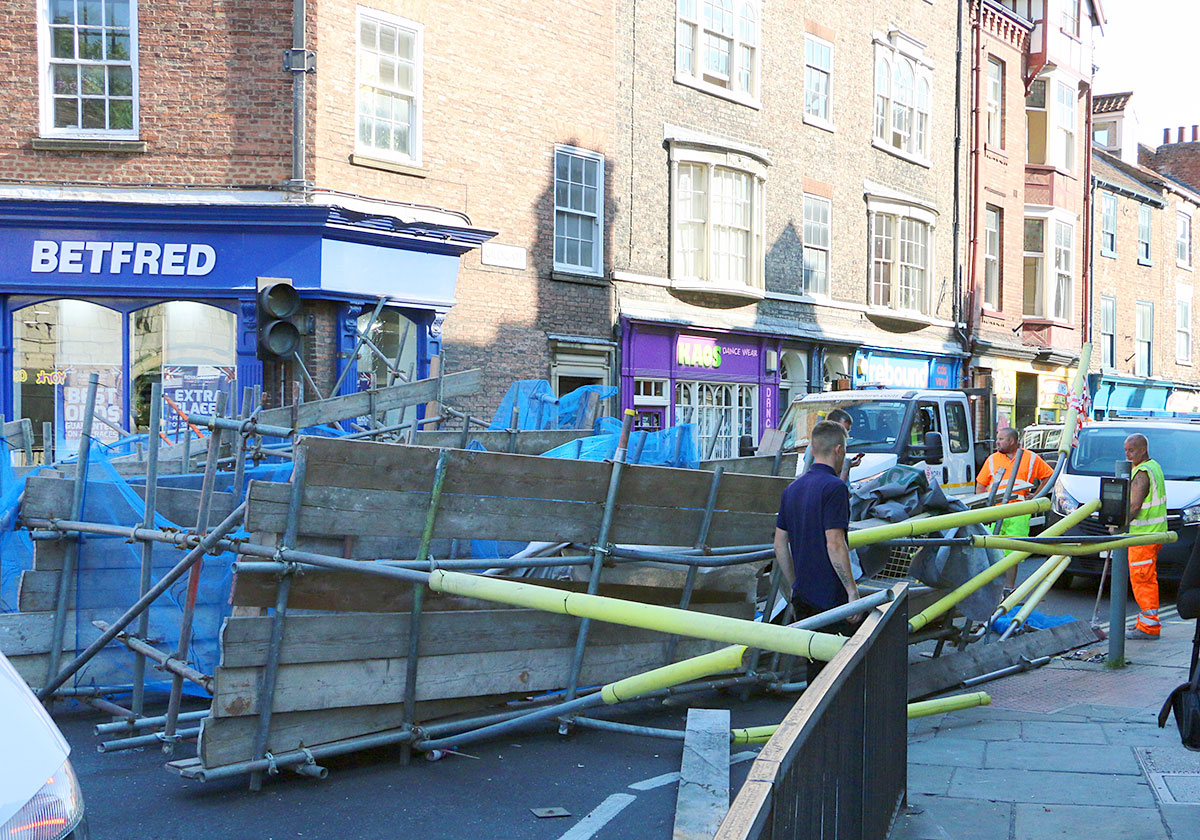 Scaffolding crashes on to York street – updated with video