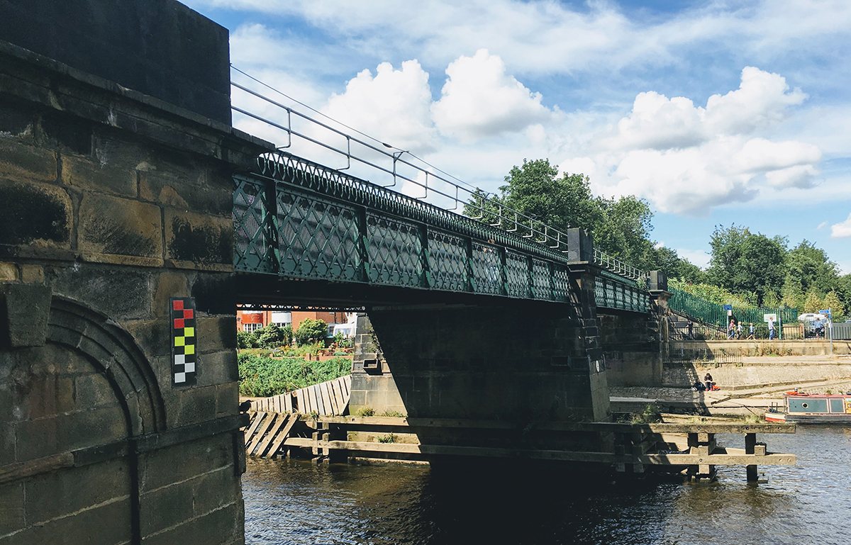 Police talk down woman threatening to throw herself in the river
