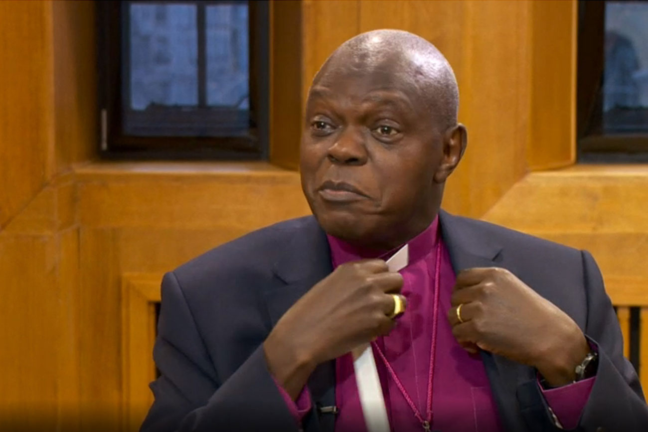 Ten years on, the Archbishop of York wears a dog collar again after Mugabe deposed