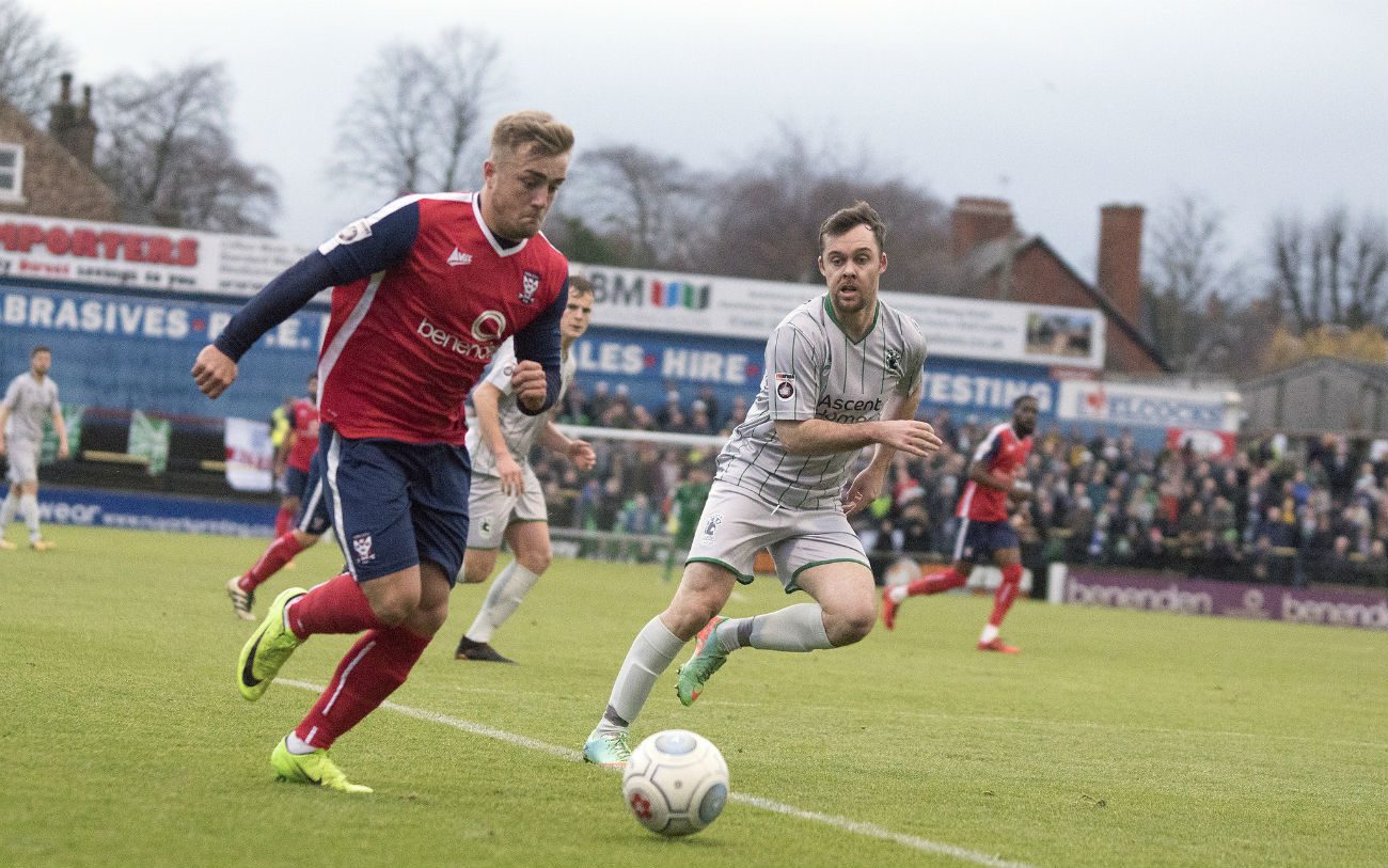 Alex Pattison takes on Blythe defender.