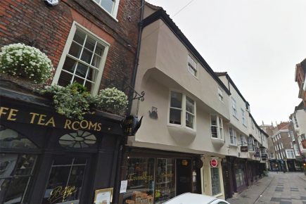 Man arrested on burglary charge after rooftop appearance closes Stonegate