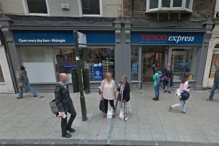Woman leaves bank card in self-service till. Next customers use it to buy shopping