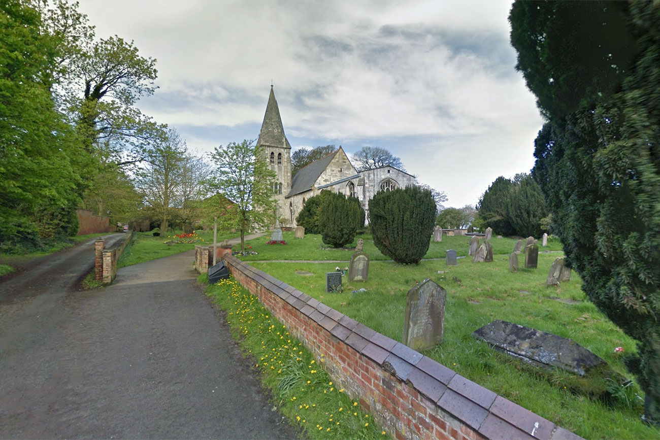 Man kicks dog and pushes its owner as he walks past York church