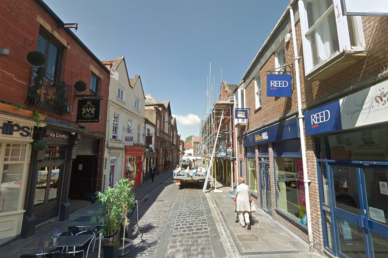 Man urinated in York shop doorway – with someone sitting in it