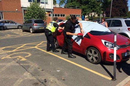 Police smash car window to save dogs left in blazing heat in York Hospital car park