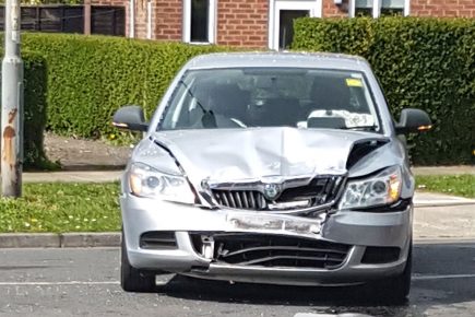 Pictures: Woman taken to hospital after Uber and bus collide