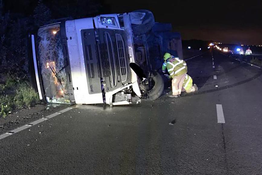 A64 west-bound closed as lorry overturns