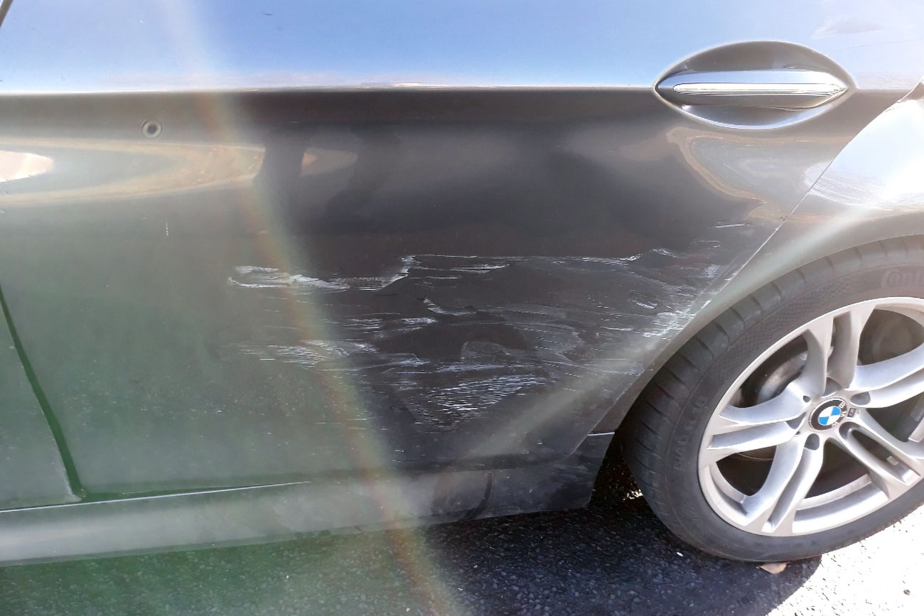 York woman pinned to her car in hit-and-run crash as she put her grandchild in the back seat