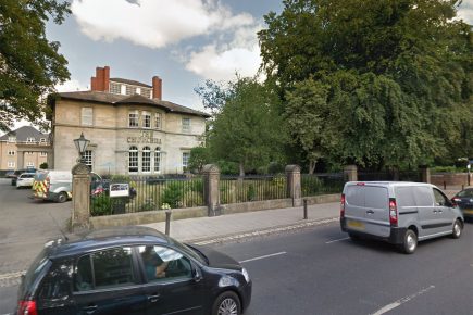 Passenger punches taxi driver in the face outside city hotel