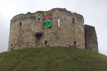 ‘Act Now’ – The unmissable climate message unfurled from Clifford’s Tower ahead of mass protest