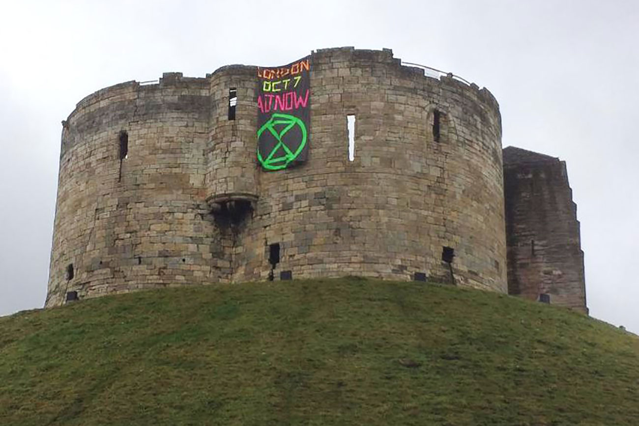 ‘Act Now’ – The unmissable climate message unfurled from Clifford’s Tower ahead of mass protest