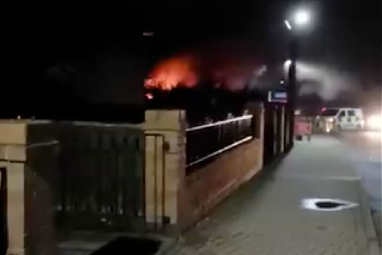 Updated: Heroic police officer saves couple from house blaze