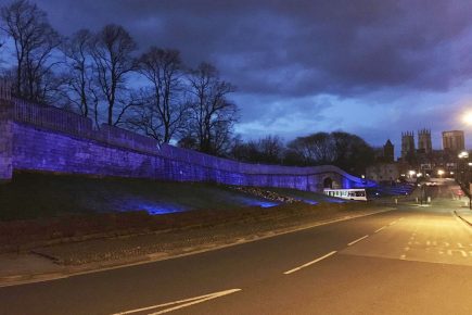 York’s walls turn blue in tribute to key workers – as thousands turn out to applaud their heroic efforts