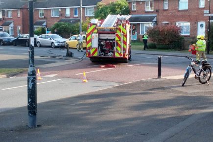 Updated: Police investigating after car crashes into parked vehicles and catches fire