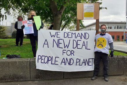 Extinction Rebellion stage action at York Hospital to demand a fairer future for all after the virus