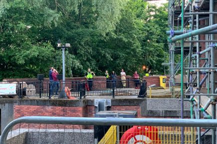 Woman charged after climbing Foss Barrier