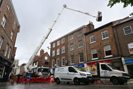 Huge crane takes over square in York city centre – Pictures and video