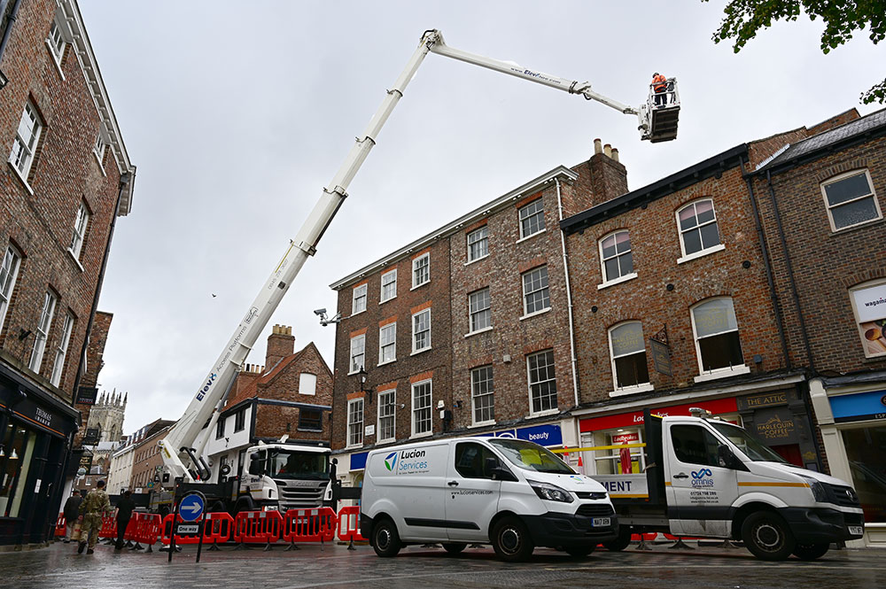 Huge crane takes over square in York city centre – Pictures and video