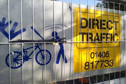 ‘Warning: You might be whacked with a baseball bat.’ Cyclists shocked by this sign on a bridge near York