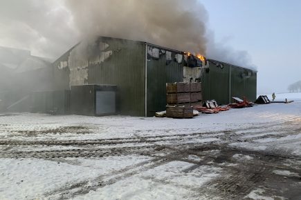 Fire crews fight fire in an agricultural unit at South Milford