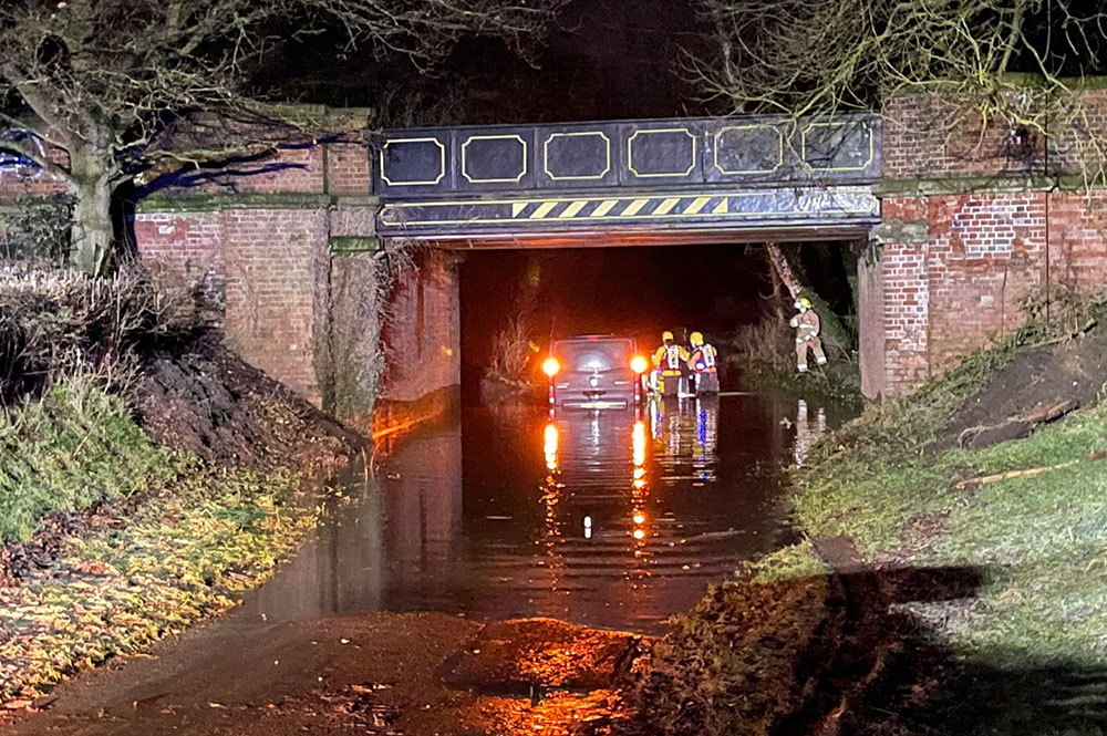 Exasperated firefighters rescue van driver from floodwaters near York