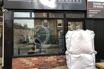 Updated: Extreme measures! Council installs sandbag blockade to stop York barbershop reopening
