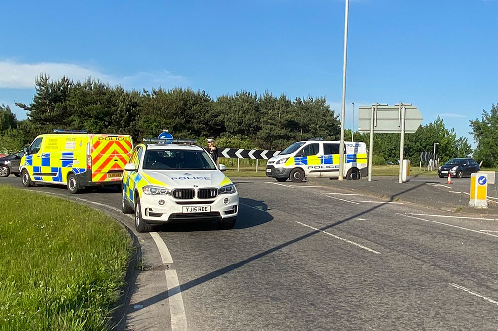 Woman dies in three-vehicle crash after frantic attempts to save her life at the roadside
