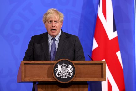 Boris Johnson says ‘We can ride this out’ as daily Covid cases exceed 200K for the first time