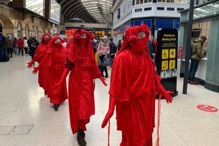 Watch: Red Rebels stage a silent procession through York Station