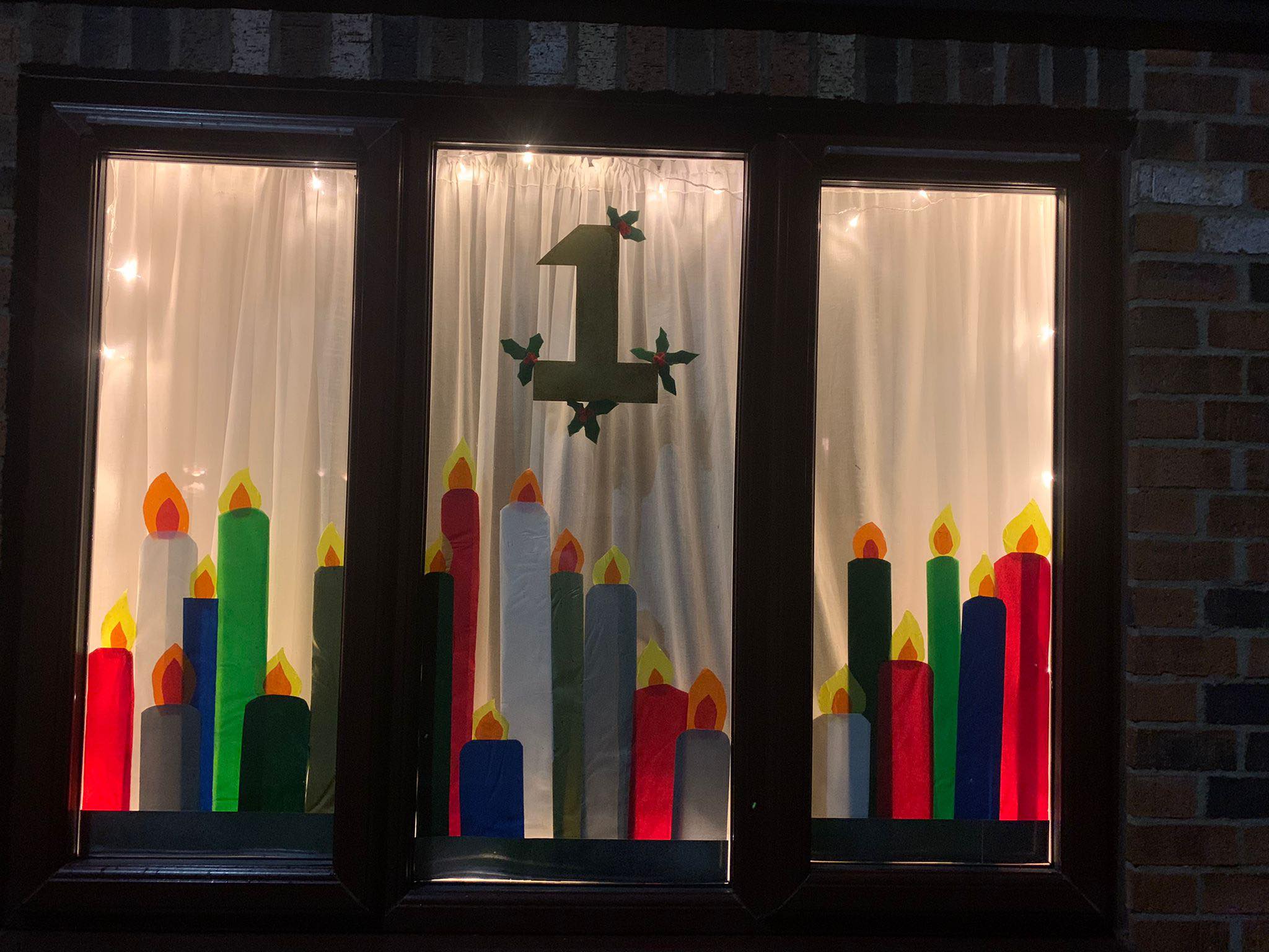 Villagers create giant Advent calendar using their front windows