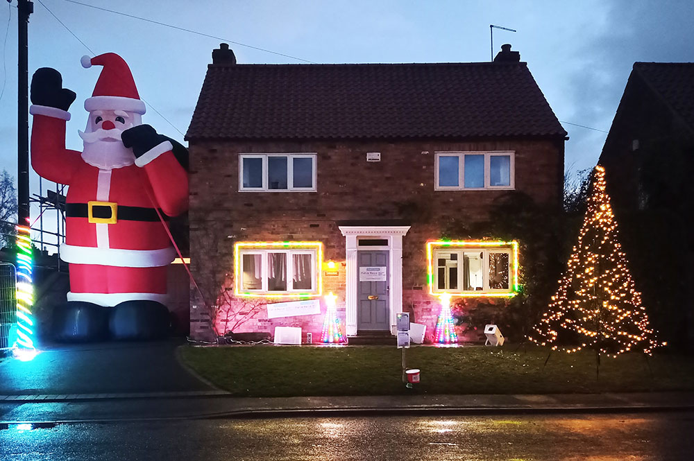 Ho ho huge! Giant Santa taller than a house stops traffic in York