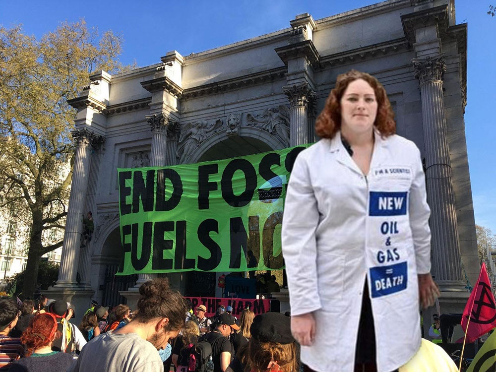 York researcher arrested after glueing herself to building as part of climate protest