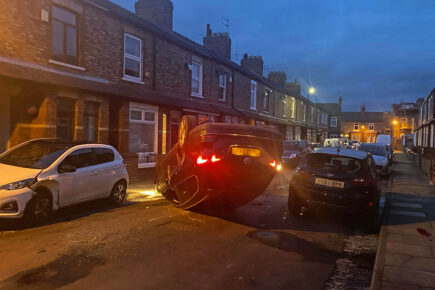 Dramatic pictures show car on its roof after crashing on York street