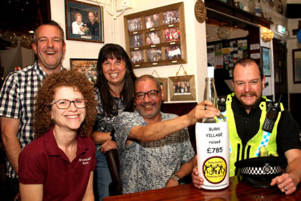 Tiny village with a big heart raises £785 for disability charity