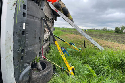 Man taken to hospital after car crashes into field