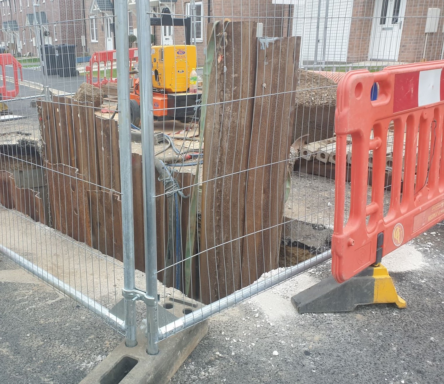 Updated: Road surface collapses as sinkhole appears on a housing estate near York