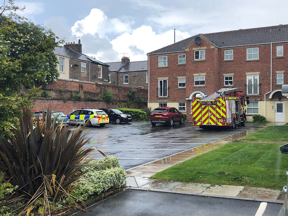 Fire crews have to force their way in to flood-hit property in York