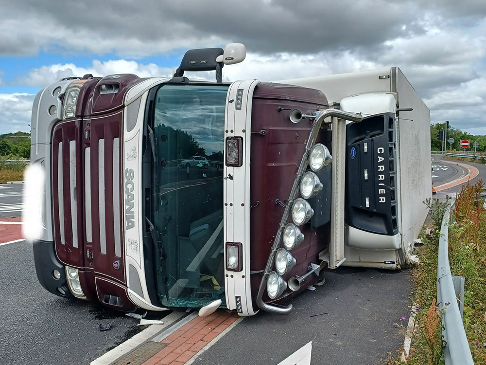 Updated: Road reopens after lorry overturned