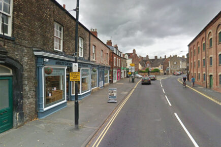Injured woman rescued from ledge in late-night drama