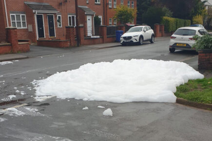 Firefighter in hazmat suit called in after mystery substance bubbles up from the drains