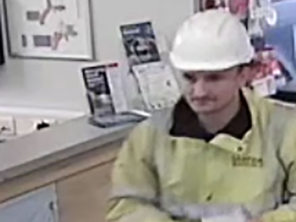 Man in hard hat and hi-vis sought after York post office theft