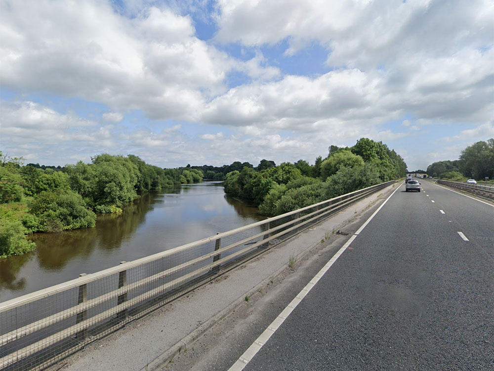 Emergency services called after man enters the River Ouse by the A64