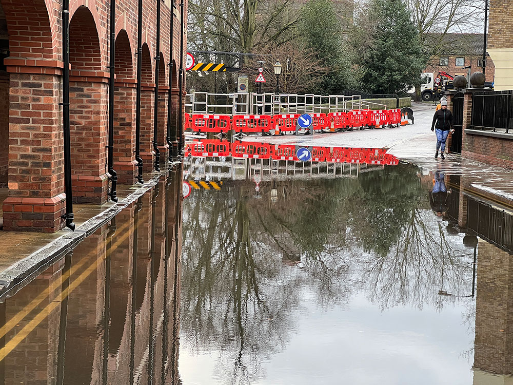 York road is closed by the floods – but city largely unaffected as river peak approaches