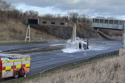 Driver taken to hospital after tanker overturns spilling ‘hazardous chemicals’ on the A1M