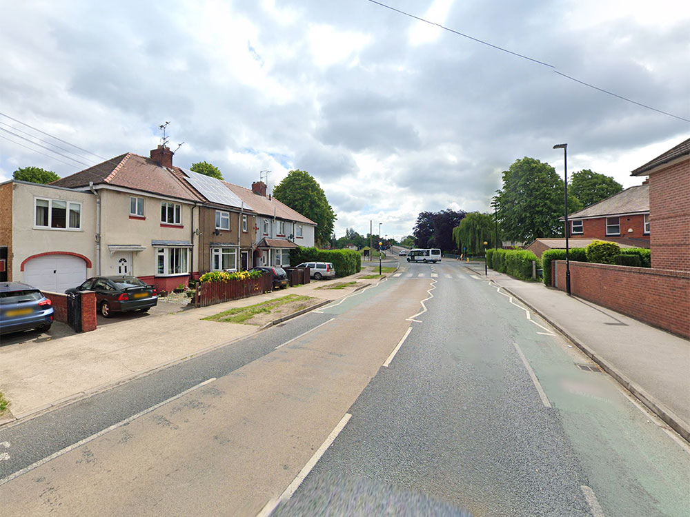 Woman treated by paramedics after York house fire