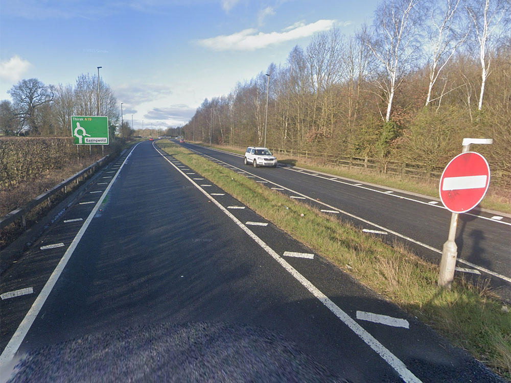 One person cut free after two vans crash on main North Yorkshire road