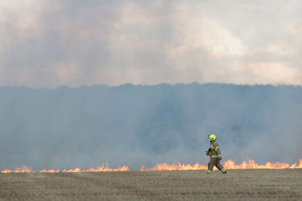 Five fire crews tackle large moorland fire sparked by train