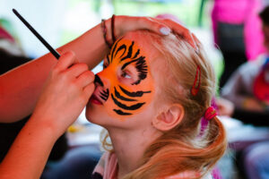York street hosts midsummer celebrations – complete with fire eating and face-painting